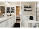 Beautiful bathroom featuring a dual sink vanity, soaking tub, and stylish decor, for a tranquil and luxurious experience at 504 Painted Cloud Pl, Las Vegas, NV 89144