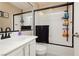 Bathroom with a framed mirror, an updated walk-in shower, and toilet at 504 Painted Cloud Pl, Las Vegas, NV 89144