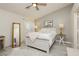Relaxing bedroom featuring cozy decor, a soft color palette, and ample natural light creating a tranquil retreat at 504 Painted Cloud Pl, Las Vegas, NV 89144
