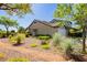 Charming home featuring desert landscaping, a welcoming entrance, and a well-maintained stucco exterior at 504 Painted Cloud Pl, Las Vegas, NV 89144