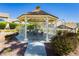 Picturesque gazebo in a common area offers a shaded retreat with seating for gatherings and relaxation at 504 Painted Cloud Pl, Las Vegas, NV 89144