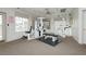 Community gym with modern weight training equipment and ample natural light at 504 Painted Cloud Pl, Las Vegas, NV 89144