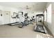 Well-equipped community gym with treadmills, elliptical, and mirrored wall at 504 Painted Cloud Pl, Las Vegas, NV 89144