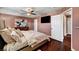 Comfortable bedroom features a ceiling fan, carpet, and great natural light at 506 Chestnut View Pl, Henderson, NV 89052