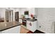 Well-lit kitchen with stainless steel appliances and stone countertops at 506 Chestnut View Pl, Henderson, NV 89052