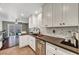 Bright kitchen with stainless steel appliances and breakfast bar that opens to a dining area at 506 Chestnut View Pl, Henderson, NV 89052