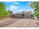 Wide backyard showcasing sand volleyball court, built-in BBQ, covered patio, and generous yard space at 5162 Somerset Dr, Las Vegas, NV 89120
