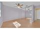 Bright bedroom featuring mirrored closet, ceiling fan and lots of sunlight at 5162 Somerset Dr, Las Vegas, NV 89120
