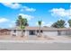 Charming single story home with palm trees and a well maintained front yard at 5162 Somerset Dr, Las Vegas, NV 89120