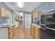 Kitchen featuring stainless appliances and light-filled interior at 5162 Somerset Dr, Las Vegas, NV 89120