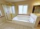 Bathroom featuring a bathtub, shower, and vanity with a sink at 5704 Burdel St, Las Vegas, NV 89149