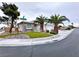 Single story home featuring a lovely corner lot, green lawn, and desert landscaping at 5704 Burdel St, Las Vegas, NV 89149
