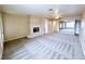 Spacious living room featuring a fireplace and large mirrored closet at 5704 Burdel St, Las Vegas, NV 89149