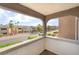 Balcony offers serene views of the community's landscaping and nearby buildings at 611 Bass Dr # C, Henderson, NV 89014