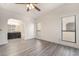 Bright bedroom with ceiling fan and archway leading to the bathroom at 611 Bass Dr # C, Henderson, NV 89014