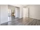 The bedroom features vinyl floors, a closet with mirrored doors, and access to a patio at 611 Bass Dr # C, Henderson, NV 89014