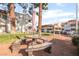 Comfortable common area with picnic benches, landscaping, and convenient parking at 611 Bass Dr # C, Henderson, NV 89014