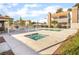 Inviting community pool with a jacuzzi and plenty of space for lounging at 611 Bass Dr # C, Henderson, NV 89014