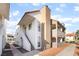 Exterior angle shot of condo building with two-story apartments and red tile roof at 611 Bass Dr # C, Henderson, NV 89014