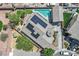 An aerial perspective of a home featuring a pool and solar panels at 6150 Bunker Commons Ct, Las Vegas, NV 89108