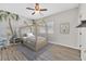 bedroom with tropical-themed wall art and a charming bed frame, creating a playful atmosphere at 6150 Bunker Commons Ct, Las Vegas, NV 89108