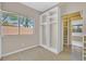 Bedroom featuring a window and closet with custom built-in shelving and ample storage at 6150 Bunker Commons Ct, Las Vegas, NV 89108
