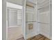 Walk-in closet with custom built-in shelving and ample storage space at 6150 Bunker Commons Ct, Las Vegas, NV 89108