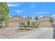Charming single-story home with well-manicured landscaping, three car garage, and inviting curb appeal at 6150 Bunker Commons Ct, Las Vegas, NV 89108