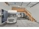 Garage featuring lofted storage area, gym equipment, and an RV at 6150 Bunker Commons Ct, Las Vegas, NV 89108
