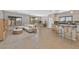 Stylishly staged living room showcasing tile floors, open layout, and breakfast bar at 6150 Bunker Commons Ct, Las Vegas, NV 89108