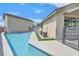 Modern pool with integrated steps, surrounded by a clean, stylish patio area at 6150 Bunker Commons Ct, Las Vegas, NV 89108