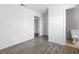 Bedroom with ensuite bathroom featuring hard surface floors at 6223 Foothill Blvd, Las Vegas, NV 89118