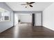 Open living room with wood floors, neutral paint, and lots of natural light at 6223 Foothill Blvd, Las Vegas, NV 89118