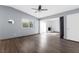 Living room featuring vaulted ceilings, lots of natural light, and wood flooring at 6223 Foothill Blvd, Las Vegas, NV 89118