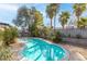 A refreshing pool with lush landscaping provides a private backyard oasis at 6223 Foothill Blvd, Las Vegas, NV 89118