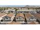 Aerial view of townhouses in a neighborhood with mountain views at 6420 Extreme Shear Ave # 102, Henderson, NV 89011