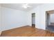Bedroom with wood floors, ceiling fan, and walk-in closet at 6420 Extreme Shear Ave # 102, Henderson, NV 89011