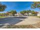 Community playground area featuring picnic tables and lush landscaping at 6420 Extreme Shear Ave # 102, Henderson, NV 89011