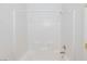 Enclosed shower with white tiles and a shower head at 6420 Extreme Shear Ave # 102, Henderson, NV 89011