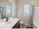Bright bathroom featuring a single sink vanity and shower-tub combo at 6731 Sumatra St, Las Vegas, NV 89166