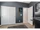 Bedroom featuring closet with white doors, gray walls, and neutral carpet flooring at 6731 Sumatra St, Las Vegas, NV 89166
