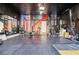 Spacious home gym with squat racks, weights, and exercise equipment at 6731 Sumatra St, Las Vegas, NV 89166