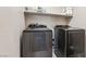 Laundry room featuring new stainless steel washer and dryer at 6731 Sumatra St, Las Vegas, NV 89166