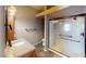 Bathroom featuring a walk-in shower with glass enclosure, vanity, and tile floors at 6901 Cobre Azul Ave # 202, Las Vegas, NV 89108