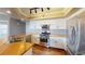 Bright kitchen featuring stainless steel appliances, sleek white cabinets, and butcher block countertops at 6901 Cobre Azul Ave # 202, Las Vegas, NV 89108