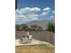 Backyard featuring pool equipment and a cinder block fence at 7650 Butterscotch Ct, Las Vegas, NV 89131