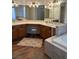 Large bathroom with granite countertop vanity and soaking tub at 7650 Butterscotch Ct, Las Vegas, NV 89131