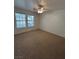 Bedroom with carpet and natural light at 7650 Butterscotch Ct, Las Vegas, NV 89131