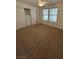 Bedroom with carpet, a closet, and natural light at 7650 Butterscotch Ct, Las Vegas, NV 89131