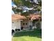 Inviting home featuring a double door entrance and a beautifully landscaped yard at 7650 Butterscotch Ct, Las Vegas, NV 89131
